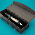 Magnetic flip-open pen box black stitching