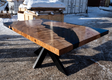 Wooden table with a river design on a snowy ground