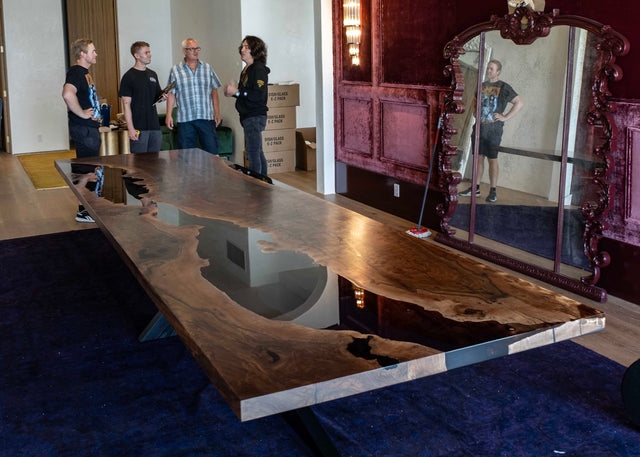 Paul Stanley River Table; Paul stands in the photo background in his home in LA