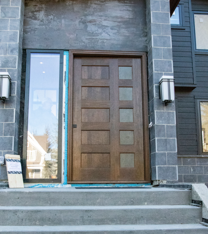 Walnut Pivot Door with Steel Panels