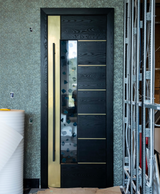 Blackened Ash and Brass Door with a Resin and Stone Panel