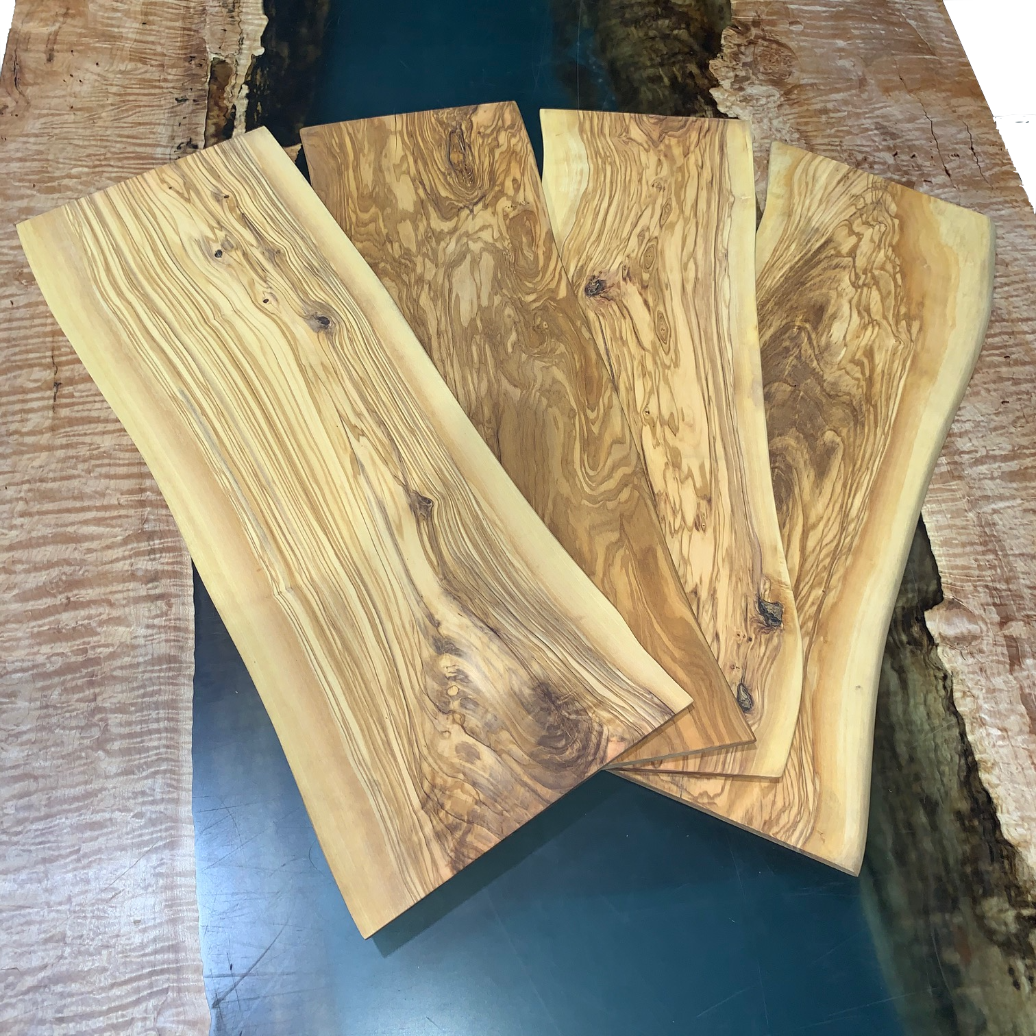 https://blackforestwood.com/cdn/shop/products/finished-olice-cutting-boards_2048x.png?v=1643842919